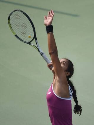 NEW DELHI, INDIA - FEBRUARY 17: Indian tennis player Ankita Raina in action against Russian tennis player Marina Melnikova during Delhi Open 2016 tournament at DLTA Complex (Delhi Lawn Tennis Association) on February 17, 2016 in New Delhi, India. (Photo by Vipin Kumar Hindustan Times ) Delhi Open 2016 Tournament