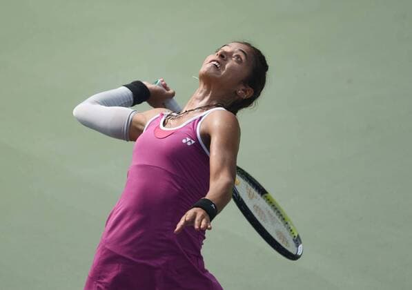 NEW DELHI, INDIA - FEBRUARY 17: Indian tennis player Ankita Raina in action against Russian tennis player Marina Melnikova during Delhi Open 2016 tournament at DLTA Complex (Delhi Lawn Tennis Association) on February 17, 2016 in New Delhi, India. (Photo by Vipin Kumar Hindustan Times ) Delhi Open 2016 Tournament