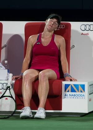 Madison Brengle (USA) sits in her chair totally exhausted, Tennis - Dubai Tennis Championships 2016 - WTA Tennis Damen - Dubai Duty Free Tennis Stadium - Dubai - - United Arab Emirates - 18 February 2016.