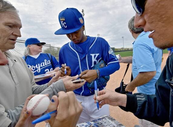 Feb. 19, 2016 - Surprise, AZ, USA - Kansas City Royals starting pitcher Yordano Ventura stops to sign autographs during a spring training workout on Friday, Feb. 19, 2016, in Surprise, Az. Kansas City Royals spring training - ZUMAm67_