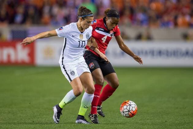 February 19, 2016: United States midfielder Carli Lloyd (10) and Trinidad & Tobago defender Danielle Blair (4) battle for the ball during a semi-final CONCACAF Olympic Qualifying soccer match between the USA and Trinidad & Tobago at BBVA Compass Stadium in Houston, TX. USA won 5-0 and earned a spot in the Summer Olympics... Soccer 2016: Trinidad & Tobago vs USA FEB 19 - ZUMAc04_