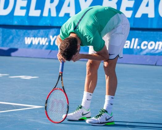Feb. 20, 2016 - Delray Beach, Florida, US - Bulgarian GRIGOR DIMITROV bows his head on court as American RAJEEV RAM upset him 6-4, 6-3 in the semi-finals of the ATP Tennis Herren World Tour Delray Beach Open in Delray Beach, Florida. ATP World Tour Delray Beach Open Semi-Finals - ZUMAd84_
