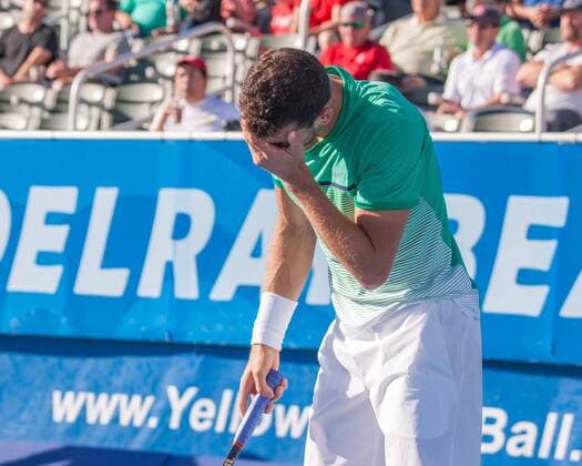 Feb. 20, 2016 - Delray Beach, Florida, US - Bulgarian GRIGOR DIMITROV bows his head on court as American RAJEEV RAM upset him 6-4, 6-3 in the semi-finals of the ATP Tennis Herren World Tour Delray Beach Open in Delray Beach, Florida. ATP World Tour Delray Beach Open Semi-Finals - ZUMAd84_