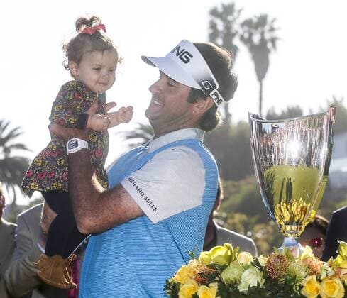 (160222) -- LOS ANGELES, Feb. 22, 2016 -- Bubba Watson of the United States celebrates with his his 15-month-old daughter Dakota after the final round of the PGA Golf Herren Tour Northern Trust Open golf tournament at the Riviera Country Club in Pacific Palisades, California, United States on Feb. 21, 2016. Bubba Watson calimed the title for the second time in three years on Sunday. )(wll) (SP)US-LOS ANGELES-GOLF-NORTHERN TRUST OPEN ZhaoxHanrong 
