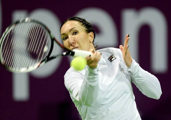 Jelena Jankovic of Serbia returns the ball during the women s singles match against Jana Cepelova of Slovakia at WTA Tennis Damen Qatar Open 2016 at the International Khalifa Tennis Complex of Doha, Qatar, Feb. 22, 2016. Jelena Jankovic won 2-1. ) (SP)QATAR-DOHA-TENNIS-QATAR OPEN 2016-WOMEN S SINGLES Nikku 