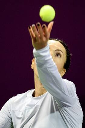 Jelena Jankovic of Serbia serves the ball during the women s singles match against Jana Cepelova of Slovakia at WTA Tennis Damen Qatar Open 2016 at the International Khalifa Tennis Complex of Doha, Qatar, Feb. 22, 2016. Jelena Jankovic won 2-1. ) (SP)QATAR-DOHA-TENNIS-QATAR OPEN 2016-WOMEN S SINGLES Nikku 