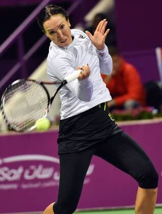 Jelena Jankovic of Serbia returns the ball during the women s singles match against Jana Cepelova of Slovakia at WTA Tennis Damen Qatar Open 2016 at the International Khalifa Tennis Complex of Doha, Qatar, Feb. 22, 2016. Jelena Jankovic won 2-1. ) (SP)QATAR-DOHA-TENNIS-QATAR OPEN 2016-WOMEN S SINGLES Nikku 