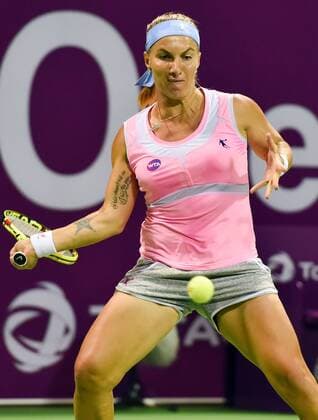 Svetlana Kuznetsova of Russia returns the ball during the women s singles match against Julia Goerges of Germany at WTA Tennis Damen Qatar Open 2016 at the International Khalifa Tennis Complex of Doha, Qatar, Feb. 22, 2016. Svetlana Kuznetsova won 2-0. ) (SP)QATAR-DOHA-TENNIS-QATAR OPEN 2016-WOMEN S SINGLES Nikku 