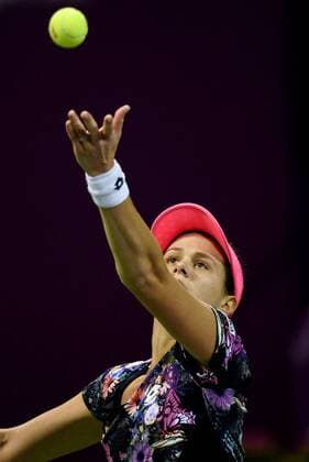 Jana Cepelova of Slovakia serves the ball during the women s singles match against Jelena Jankovic of Serbia at WTA Tennis Damen Qatar Open 2016 at the International Khalifa Tennis Complex of Doha, Qatar, Feb. 22, 2016. Jelena Jankovic won 2-1. ) (SP)QATAR-DOHA-TENNIS-QATAR OPEN 2016-WOMEN S SINGLES Nikku 