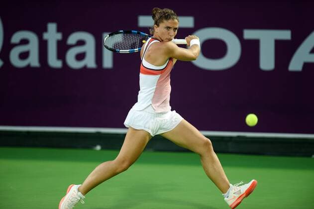 Sara Errani of Italy returns the ball during the women s singles match against Tsvetana Pironkova of Bulgaria at WTA Tennis Damen Qatar Open 2016 at the International Khalifa Tennis Complex of Doha, Qatar, Feb. 22, 2016. Sara Errani won 2-1. ) (SP)QATAR-DOHA-TENNIS-QATAR OPEN 2016-WOMEN S SINGLES Nikku 