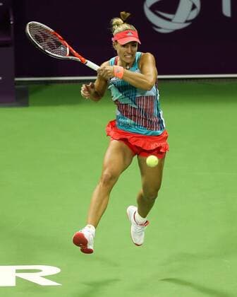 Angelique Kerber of Germany competes during the women s singles second round match against Zheng Saisai of China at the WTA Tennis Damen Qatar Open 2016 in Doha, Qatar, Feb. 23, 2016. Kerber lost 0-2. ) (SP)QATAR-DOHA-TENNIS-QATAR OPEN 2016-WOMEN S SINGLES Nikku 
