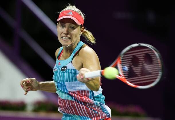 Angelique Kerber of Germany competes during the women s singles second round match against Zheng Saisai of China at the WTA Tennis Damen Qatar Open 2016 in Doha, Qatar, Feb. 23, 2016. Kerber lost 0-2. ) (SP)QATAR-DOHA-TENNIS-QATAR OPEN 2016-WOMEN S SINGLES Nikku 