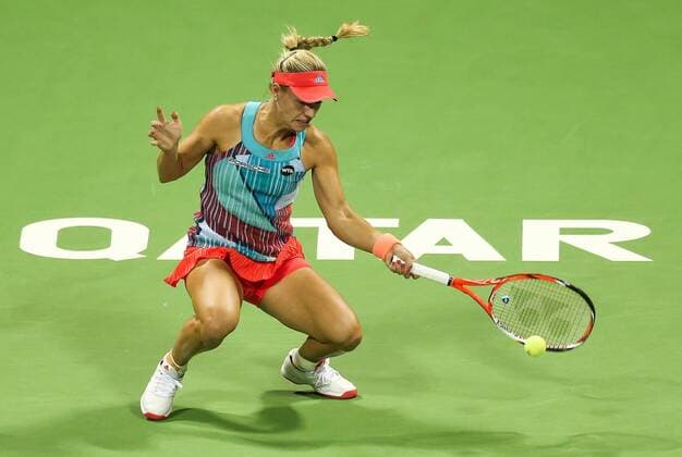 Angelique Kerber of Germany competes during the women s singles second round match against Zheng Saisai of China at the WTA Tennis Damen Qatar Open 2016 in Doha, Qatar, Feb. 23, 2016. Kerber lost 0-2. ) (SP)QATAR-DOHA-TENNIS-QATAR OPEN 2016-WOMEN S SINGLES Nikku 
