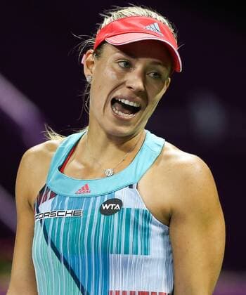 Angelique Kerber of Germany reacts during the women s singles second round match against Zheng Saisai of China at the WTA Tennis Damen Qatar Open 2016 in Doha, Qatar, Feb. 23, 2016. Kerber lost 0-2. ) (SP)QATAR-DOHA-TENNIS-QATAR OPEN 2016-WOMEN S SINGLES Nikku 