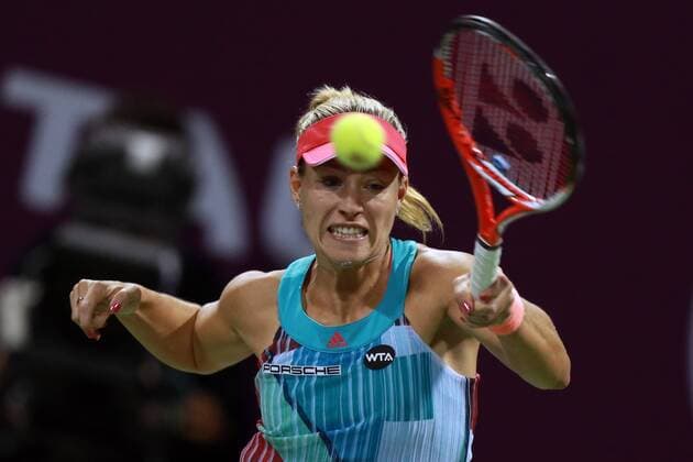Angelique Kerber of Germany competes during the women s singles second round match against Zheng Saisai of China at the WTA Tennis Damen Qatar Open 2016 in Doha, Qatar, Feb. 23, 2016. Kerber lost 0-2. ) (SP)QATAR-DOHA-TENNIS-QATAR OPEN 2016-WOMEN S SINGLES Nikku 