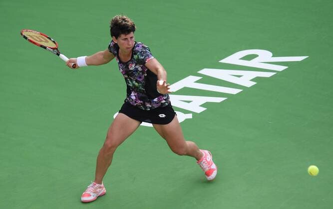 (160225) -- DOHA, Feb. 25, 2016 -- Carla Suarez Navarro of Spain competes during the singles third round match against Timea Bacsinszky of Switzerland at the WTA Tennis Damen Qatar Open 2016 in Doha, Qatar, Feb. 24, 2016. Carla Suarez Navarro won 2-0. ) (SP)QATAR-DOHA-TENNIS-WTA QATAR OPEN 2016 Nikku 