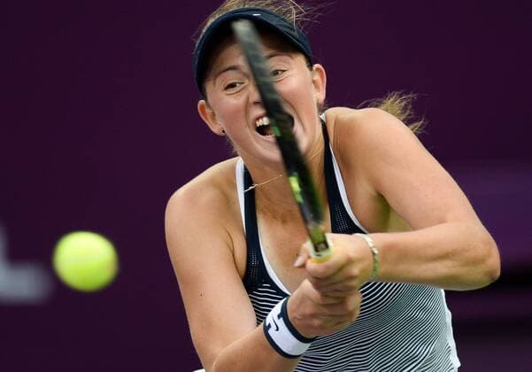 (160225) -- DOHA, Feb. 25, 2016 -- Jelena Ostapenko of Latvia competes during the singles third round match against Petra Kvitova of the Czech Republic at the WTA Tennis Damen Qatar Open 2016 in Doha, Qatar, Feb. 24, 2016. Jelena Ostapenko won 2-1. ) (SP)QATAR-DOHA-TENNIS-WTA QATAR OPEN 2016 Nikku 