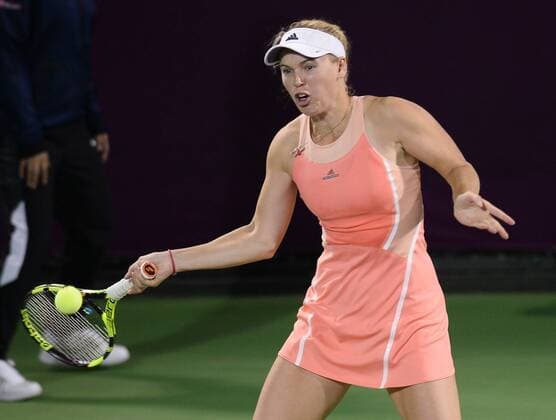 (160225) -- DOHA, Feb. 25, 2016 -- Caroline Wozniacki of Denmark competes during the singles third round match against Elena Vesnina of Russia at the WTA Tennis Damen Qatar Open 2016 in Doha, Qatar, Feb. 24, 2016. Elena Vesnina won 2-1. ) (SP)QATAR-DOHA-TENNIS-WTA QATAR OPEN 2016 Nikku 
