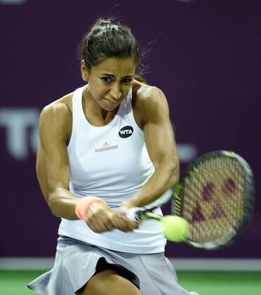 (160225) -- DOHA, Feb. 25, 2016 -- Cagla Buyukakcay of Turkey competes during the singles third round match against Roberta Vinci of Italy at the WTA Tennis Damen Qatar Open 2016 in Doha, Qatar, Feb. 24, 2016. Roberta Vinci won 2-0. ) (SP)QATAR-DOHA-TENNIS-WTA QATAR OPEN 2016 Nikku 
