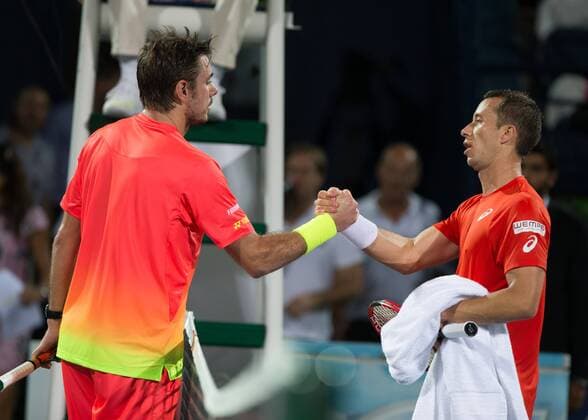 L-R. Philipp Kohlschreiber gratuliert dem Sieger Stan Stanislas Wawrinka (SUI) am Netz, Tennis - Dubai Duty Free Tennis Championships - ATP Tennis Herren - - Dubai - - United Arab Emirates - 25 February 2016. Â