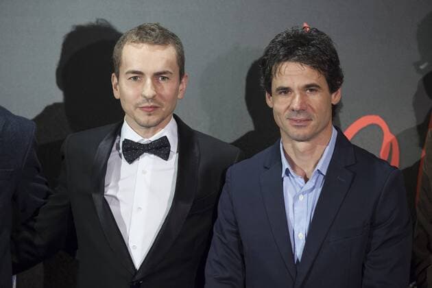 Spanish MotoGP rider Jorge Lorenzo poses with former rider Alex Criville during Lorenzo s documentary presentation in Madrid, Spain. February 25, 2016.  (20160225036)