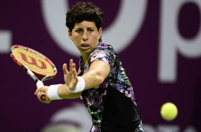 DOHA, Feb. 25, 2016 -- Carla Suarez Navarro of Spain competes during the women s singles quarterfinal match against Elena Vesnina of Russia at the WTA Tennis Damen Qatar Open 2016 in Doha, Qatar, Feb. 25, 2016. Carla Suarez Navarro won 2-0. ) (SP)QATAR-DOHA-TENNIS-WTA QATAR OPEN 2016 Nikku 