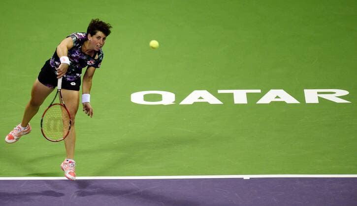 DOHA, Feb. 25, 2016 -- Carla Suarez Navarro of Spain competes during the women s singles quarterfinal match against Elena Vesnina of Russia at the WTA Tennis Damen Qatar Open 2016 in Doha, Qatar, Feb. 25, 2016. Carla Suarez Navarro won 2-0. ) (SP)QATAR-DOHA-TENNIS-WTA QATAR OPEN 2016 Nikku 