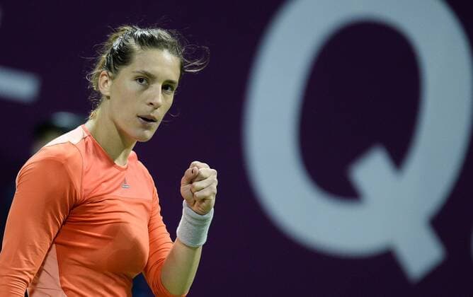 DOHA, Feb. 25, 2016 -- Andrea Petkovic of Germany reacts during the women s singles quarterfinal match against Garbine Muguruza of Spain at the WTA Tennis Damen Qatar Open 2016 in Doha, Qatar, Feb. 25, 2016. Andrea Petkovic won 2-1. ) (SP)QATAR-DOHA-TENNIS-WTA QATAR OPEN 2016 Nikku 