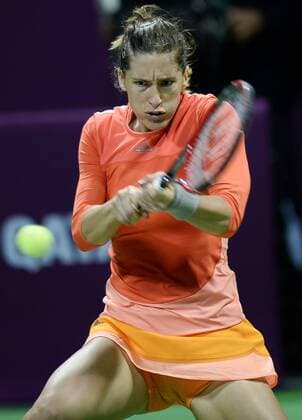 DOHA, Feb. 25, 2016 -- Andrea Petkovic of Germany competes during the women s singles quarterfinal match against Garbine Muguruza of Spain at the WTA Tennis Damen Qatar Open 2016 in Doha, Qatar, Feb. 25, 2016. Andrea Petkovic won 2-1. ) (SP)QATAR-DOHA-TENNIS-WTA QATAR OPEN 2016 Nikku 