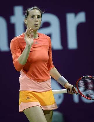 DOHA, Feb. 25, 2016 -- Andrea Petkovic of Germany reacts during the women s singles quarterfinal match against Garbine Muguruza of Spain at the WTA Tennis Damen Qatar Open 2016 in Doha, Qatar, Feb. 25, 2016. Andrea Petkovic won 2-1. ) (SP)QATAR-DOHA-TENNIS-WTA QATAR OPEN 2016 Nikku 
