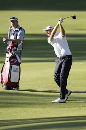 26.02.2016. Perth, Australia. ISPS HANDA Perth International Golf. Nicolas Colsaerts (BEL) with a wood from the 11th fairway while being watched by his caddy during day 2. xDavidxWoodleyx  ActionPlus11711131