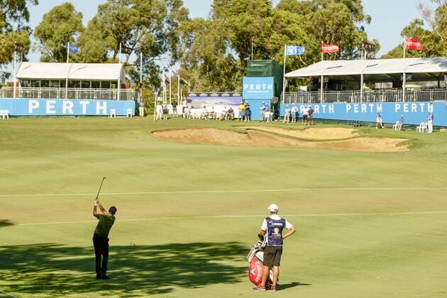 26.02.2016. Perth, Australia. ISPS HANDA Perth International Golf. James Morrison (ENG) plays an approach shot onto the 18th green during day 2. xDavidxWoodleyx  ActionPlus11711164