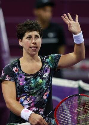 (160227) -- DOHA, Feb. 26, 2016 -- Carla Suarez Navarro of Spain celebrates during the women s singles semi-final match against Agnieszka Radwanska of Poland at the WTA Tennis Damen Qatar Total Open 2016 in Doha, Qatar Feb. 26, 2016. Carla Suraez Navarro won 2-0. ) (SP)QATAR-DOHA-TENNIS-WTA QATAR OPEN 2016 Nikku 