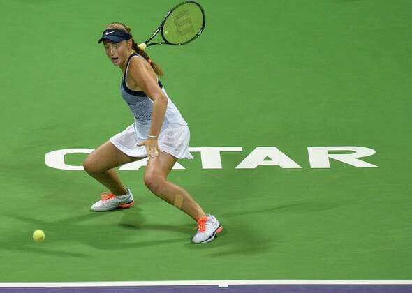 (160227) -- DOHA, Feb. 26, 2016 -- Jelena Ostapenko of Latvia returns the ball during the women s singles semi-final match against Andrea Petkovic of Germany at the WTA Tennis Damen Qatar Total Open 2016 in Doha, Qatar Feb. 26, 2016. Jelena Ostapenko won 7-5, 1-0 after Andrea Petkovic abandoned due to an injury. ) (SP)QATAR-DOHA-TENNIS-WTA QATAR OPEN 2016 Nikku 