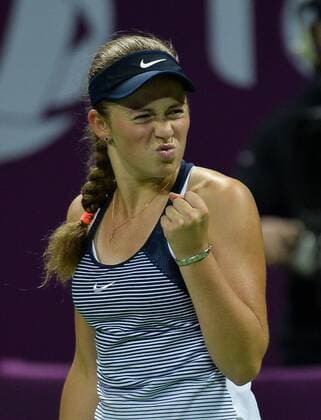 (160227) -- DOHA, Feb. 26, 2016 -- Jelena Ostapenko of Latvia celebrates during the women s singles semi-final match against Andrea Petkovic of Germany at the WTA Tennis Damen Qatar Total Open 2016 in Doha, Qatar Feb. 26, 2016. Jelena Ostapenko won 7-5, 1-0 after Andrea Petkovic abandoned due to an injury. ) (SP)QATAR-DOHA-TENNIS-WTA QATAR OPEN 2016 Nikku 