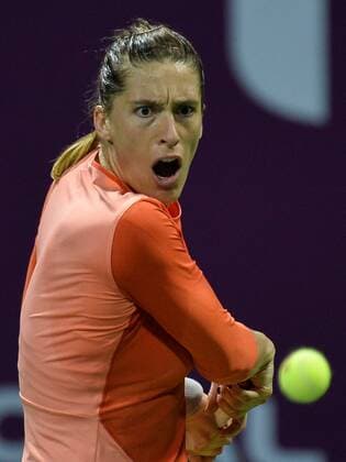 (160227) -- DOHA, Feb. 26, 2016 -- Andrea Petkovic of Germany returns the ball during the women s singles semi-final match against Jelena Ostapenko of Latvia at the WTA Tennis Damen Qatar Total Open 2016 in Doha, Qatar Feb. 26, 2016. Jelena Ostapenko won 7-5, 1-0 after Andrea Petkovic abandoned due to an injury. ) (SP)QATAR-DOHA-TENNIS-WTA QATAR OPEN 2016 Nikku 