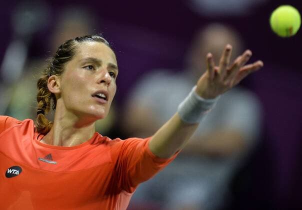 (160227) -- DOHA, Feb. 26, 2016 -- Andrea Petkovic of Germany serves the ball during the women s singles semi-final match against Jelena Ostapenko of Latvia at the WTA Tennis Damen Qatar Total Open 2016 in Doha, Qatar Feb. 26, 2016. Jelena Ostapenko won 7-5, 1-0 after Andrea Petkovic abandoned due to an injury. ) (SP)QATAR-DOHA-TENNIS-WTA QATAR OPEN 2016 Nikku 