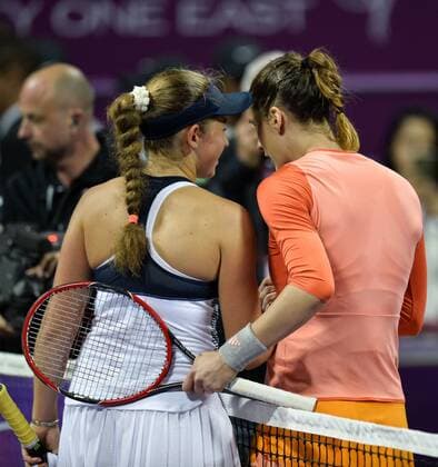 (160227) -- DOHA, Feb. 26, 2016 -- Andrea Petkovic (R) of Germany shakes hands with Jelena Ostapenko of Latvia before leaving the court after retiring due to injury at the WTA Tennis Damen Qatar Ladies Open tennis tournament at the International Khalifa Tennis Complex in Doha, Qatar Feb. 26, 2016. Jelena Ostapenko won 7-5, 1-0 after Andrea Petkovic abandoned due to an injury. ) (SP)QATAR-DOHA-TENNIS-WTA QATAR OPEN 2016 Nikku 