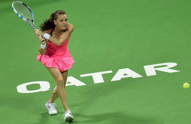 (160227) -- DOHA, Feb. 26, 2016 -- Agnieszka Radwanska of Poland returns the ball during the women s singles semi-final match against Carla Suarez Navarro of Spain at the WTA Tennis Damen Qatar Total Open 2016 in Doha, Qatar Feb. 26, 2016. Carla Suraez Navarro won 2-0. ) (SP)QATAR-DOHA-TENNIS-WTA QATAR OPEN 2016 Nikku 