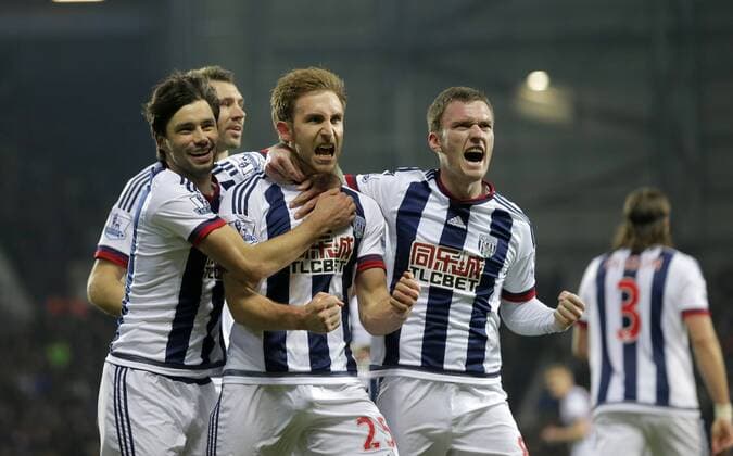 Craig Dawson (centre) celebrates scoring the second goal of the game for West Bromwich Albion - Football - Barclays Premier League - West Bromwich Albion vs Crystal Palace - The Hawthorns West Bromwich - Season 2015 2016 - 27th February 2016 - Photo Malcolm Couzens Sportimage EDITORIAL USE ONLY. No use with unauthorised audio, video, data, fixture lists, club league logos or live services. Online in-match use limited to 120 images, no video emulation. No use in betting, games or single club league player publications.