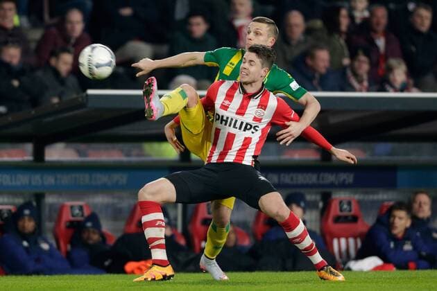(L-R) Timothy Derijck of ADO Den Haag, Marco van Ginkel of PSV during the Dutch Eredivisie match between PSV Eindhoven and ADO Den Haag at the Phillips stadium on February 27, 2016 in Eindhoven, The Netherlands PSV Eindhoven v ADO Den Haag Dutch Eredivisie 2015 2016 xVIxxIVx 5056777