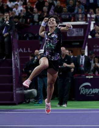 Carla Suarez Navarro of Spain celebrates after winning the women s singles final against Jelena Ostapenko of Latvia at the WTA Tennis Damen Qatar Total Open 2016 at the International Khalifa Tennis Complex in Doha, Qatar February 27, 2016. Carla Suarez Navarro won 2-1 and claimed the title. ) (SP)QATAR-DOHA-TENNIS-WTA QATAR OPEN 2016 Nikku 