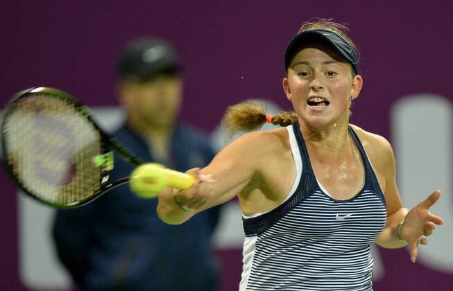 Jelena Ostapenko of Latvia returns ball during women s singles final against Carla Suarez Navarro of Spain in the at the WTA Tennis Damen Qatar Total Open 2016 at the International Khalifa Tennis Complex Doha, Qatar February 27, 2016. Carla Suarez Navarro won 2-1 and claimed the title. ) (SP)QATAR-DOHA-TENNIS-WTA QATAR OPEN 2016 Nikku 