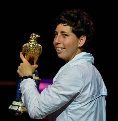 Carla Suarez Navarro of Spain poses with winner s trophy during the awarding ceremony for women s singles at the WTA Tennis Damen Qatar Total Open 2016 at the International Khalifa Tennis Complex Doha, Qatar February 27, 2016. Carla Suarez Navarro won 2-1 and claimed the title. ) (SP)QATAR-DOHA-TENNIS-WTA QATAR OPEN 2016 Nikku 