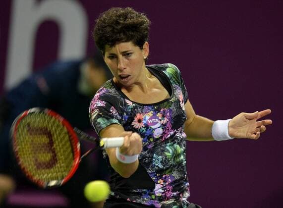 Carla Suarez Navarro of Spain returns the ball during women s singles final against Jelena Ostapenko of Latvia in the at the WTA Tennis Damen Qatar Total Open 2016 at the International Khalifa Tennis Complex Doha, Qatar February 27, 2016. Carla Suarez Navarro won 2-1 and claimed the title. ) (SP)QATAR-DOHA-TENNIS-WTA QATAR OPEN 2016 Nikku 