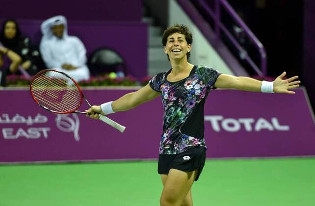 Carla Suarez Navarro of Spain celebrates after winning the women s singles final against Jelena Ostapenko of Latvia at the WTA Tennis Damen Qatar Total Open 2016 at the International Khalifa Tennis Complex in Doha, Qatar February 27, 2016. Carla Suarez Navarro won 2-1 and claimed the title. ) (SP)QATAR-DOHA-TENNIS-WTA QATAR OPEN 2016 Nikku 
