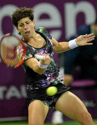 Carla Suarez Navarro of Spain returns the ball during women s singles final against Jelena Ostapenko of Latvia in the at the WTA Tennis Damen Qatar Total Open 2016 at the International Khalifa Tennis Complex Doha, Qatar February 27, 2016. Carla Suarez Navarro won 2-1 and claimed the title. ) (SP)QATAR-DOHA-TENNIS-WTA QATAR OPEN 2016 Nikku 