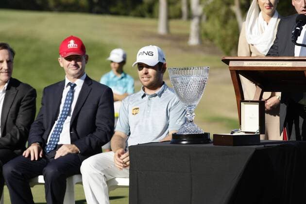 28.02.2016. Perth, Australia. ISPS HANDA Perth International Golf. Louis Oosthuizen (ZAF) sits with his trophy after winning the tournament by one shot. xDavidxWoodleyx  ActionPlus11712215