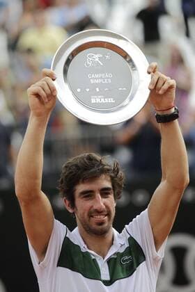 Uruguayan tennis player Pablo Cuevas lifts the champion trophy after the final match of the Brazil Open against Spanish Pablo Carreno Busta in Sao Paulo, Brazil, 28 February 2016. Pablo Carreno Busta vs Pablo Cuevas !ACHTUNG: NUR REDAKTIONELLE NUTZUNG!  20160228-635922875496717846