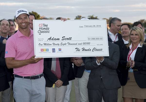28 February 2016: Adam Scott smiles as he holds the check after winning the final round of the Honda Classic at the PGA Golf Herren National Resort & Spa in Palm Beach Gardens, FL. (Photo by Doug Murray Icon Sportswire) GOLF: FEB 28 PGA - The Honda Classic - Final Round Icon796160228008 EDITORIAL USE ONLY